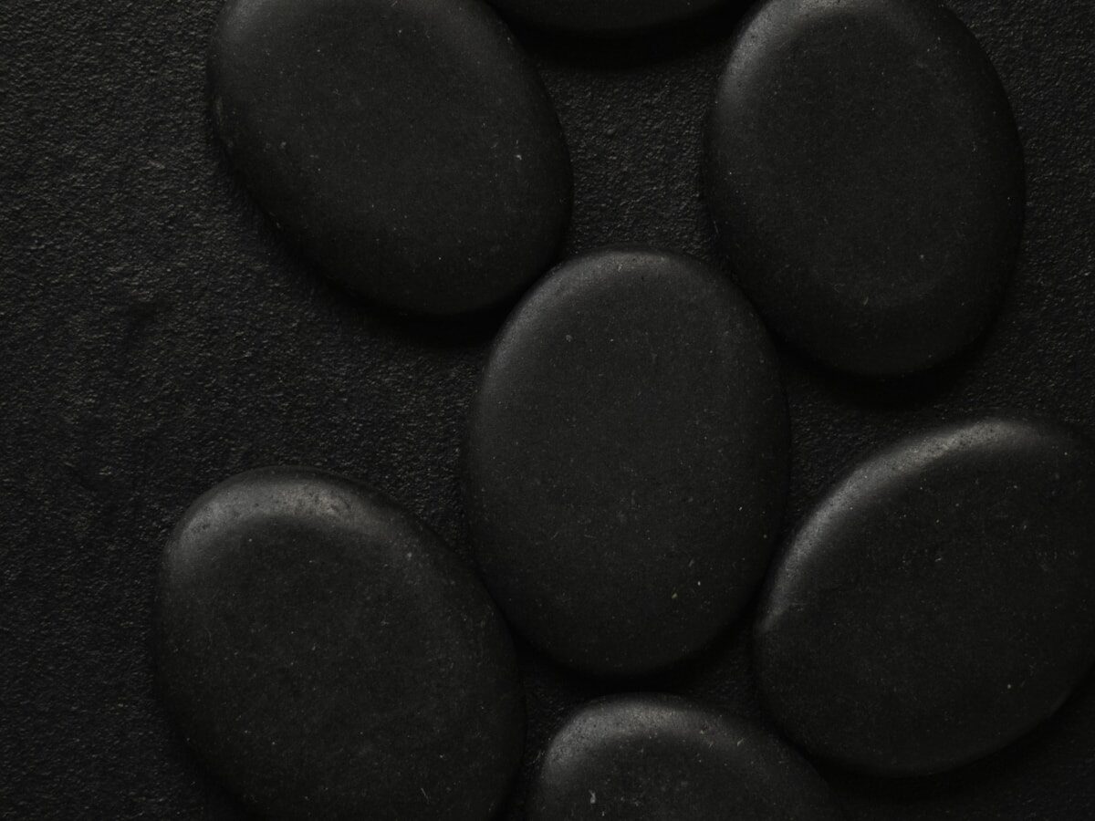 Close-up of dark volcanic lava stones sourced from Japan